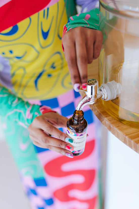 Nimki model, Eshib, refilling a bottle of celestial massage oil
