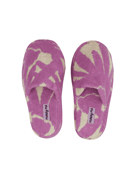 Mosey Me Slippers: A super cute design featuring a cream background with a plum purple flower across the print. They are made with cotton and have a fun texture to them making the design feel 3D. 