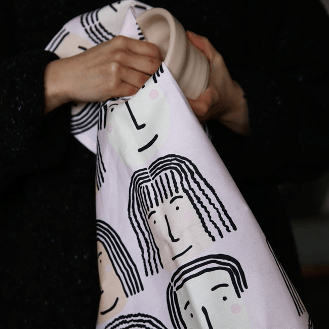 Shuh Lee Fab Faces Tea Towel in use