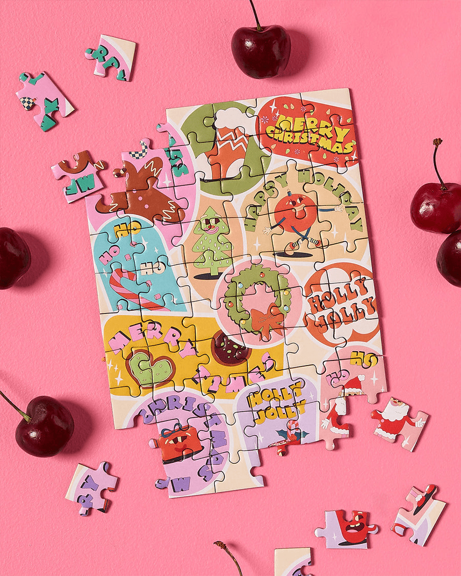 Journey of Something Greeting Card: A super cute puzzle card inspired by Christmas. It features santas, gingerbread men and christmas reaths. 