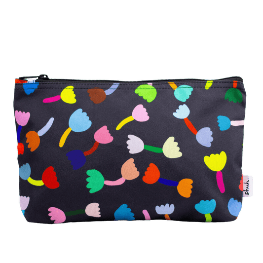 Shuh Lee's Tulip Useful Bag: A colourful print with a black background and multicoloured tulips scattered across the front and back. 