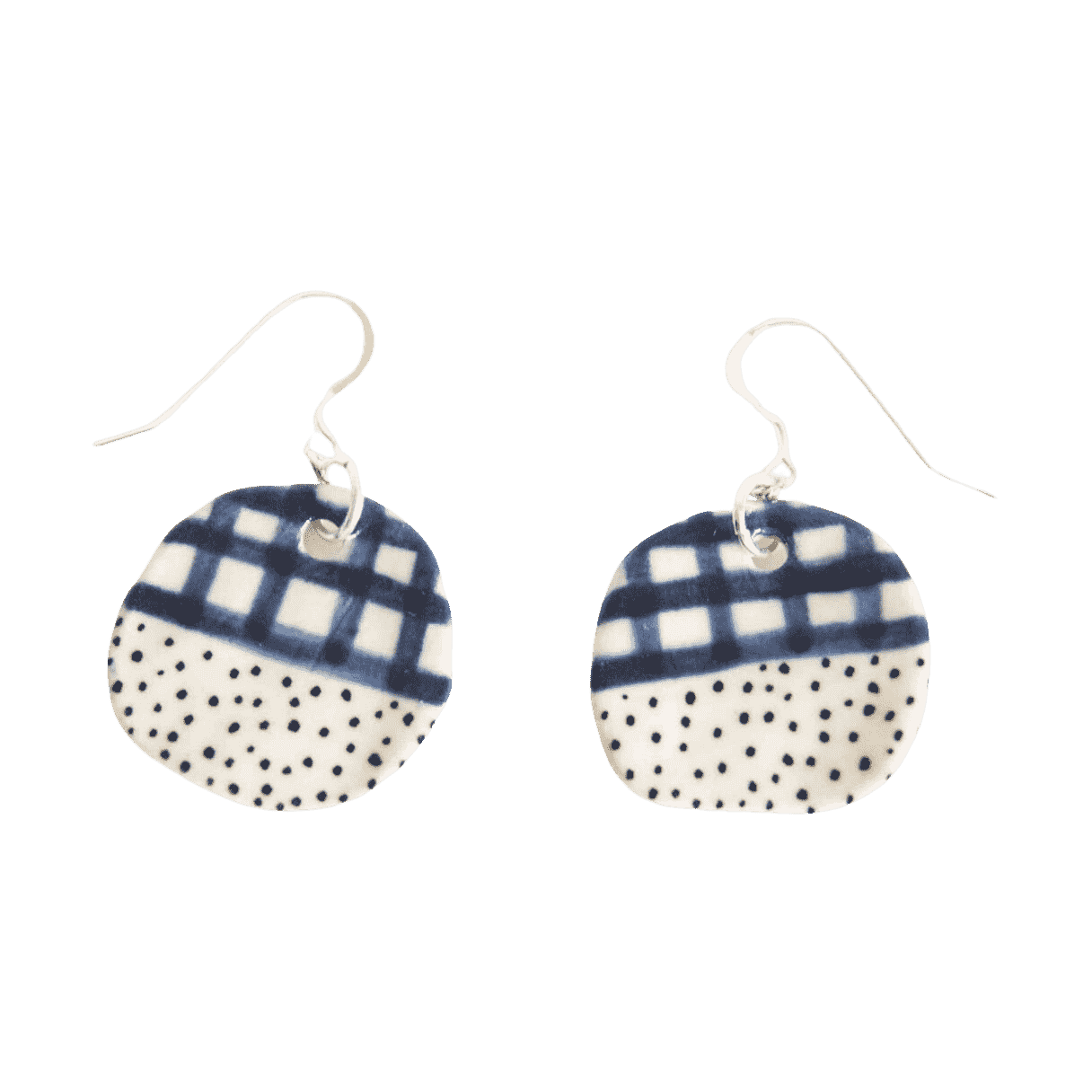 Shuh Lee 'Halfy' Earrings. They have a neat hook at the top and a ceramic, circle attached adorned with half a blue patchwork pattern and underneath black speckles. 