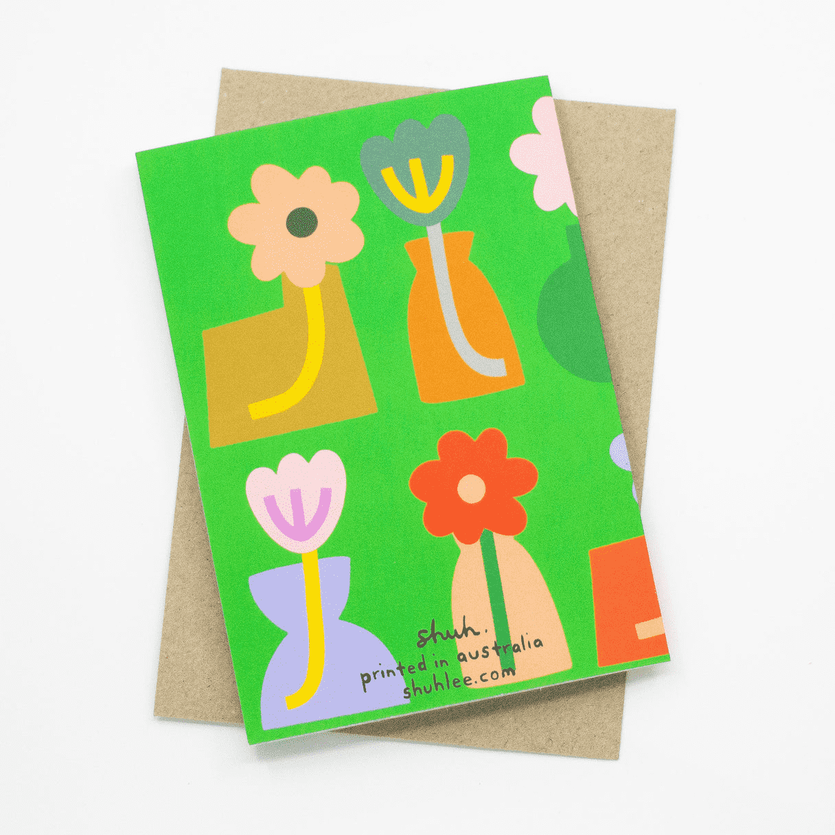 Shuh Lee Vases Greeting card: A bright green background with six colourful vases and flowers across the front and back. 