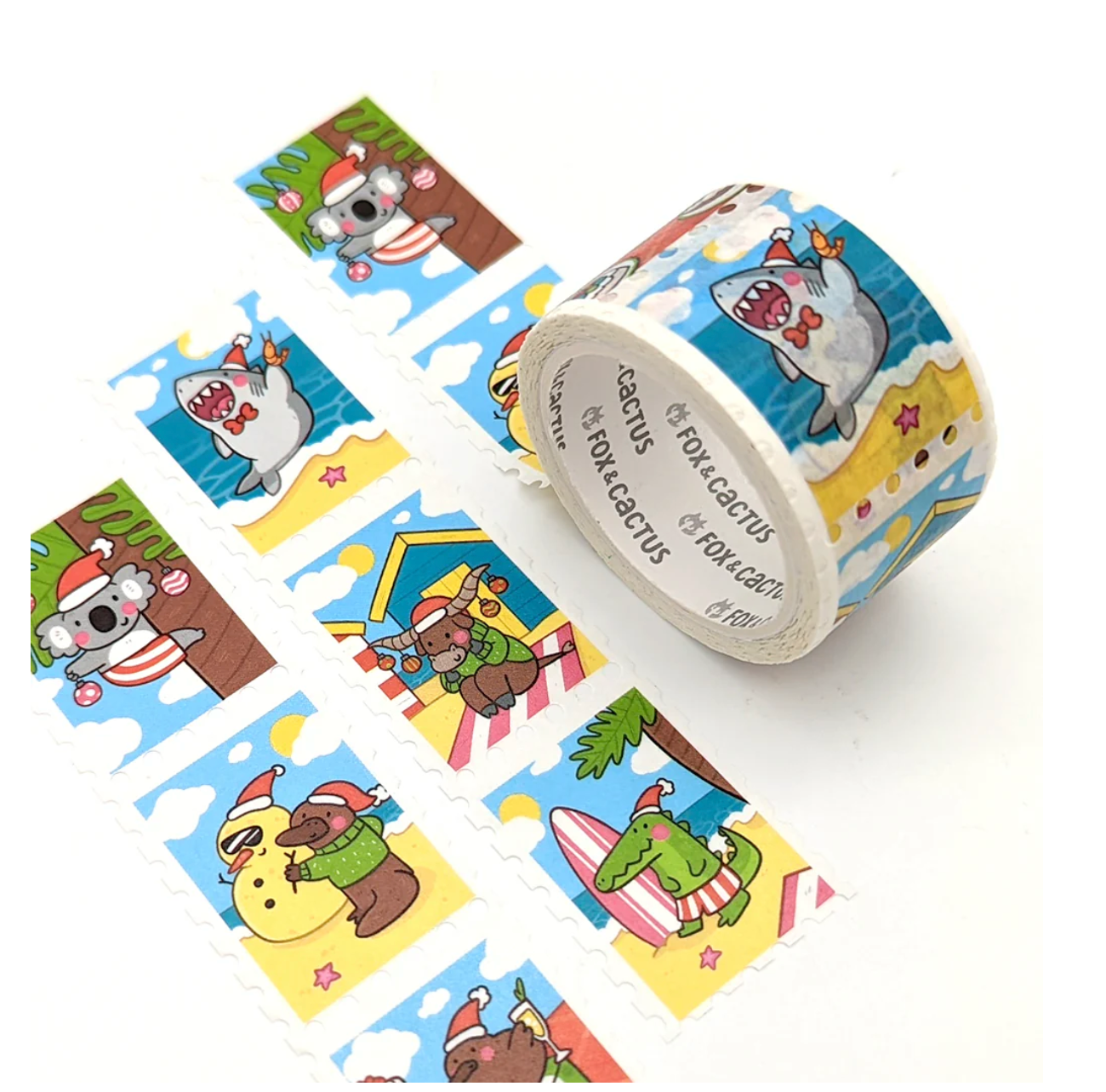 Decorative Christmas washi tape by Fox & Cactus: Cute Aussie animals dressed in xmas attire, on the beach, up trees and in the water in cut out stamp shapes. 